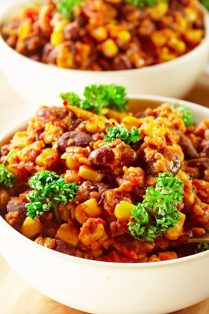 Craving a hearty dish? Try this 20-minute easy Vegan chili recipe made with pantry staples, you probably already have in your pantry! With a secret ingredient for added body and richness